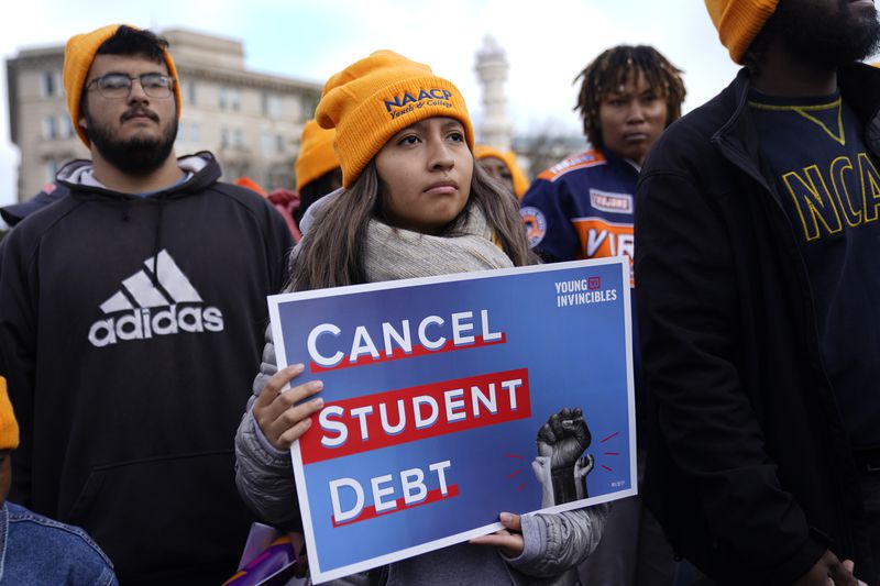 Student debt relief advocates gather outside the Supreme Court on Capitol Hill in Washington, Tuesday, Feb. 28, 2023. (AP Photo/Patrick Semansky)