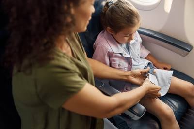 US proposal would bar airline fees for parents to sit beside kids on flights