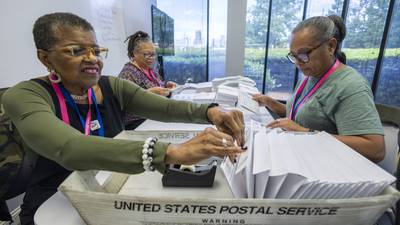 Election officials warn that widespread problems with the U.S. mail system could disrupt voting