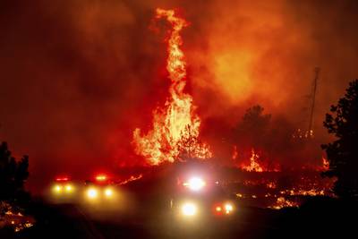 Firefighters get some help from cooler temperatures after California’s largest wildfire explodes 