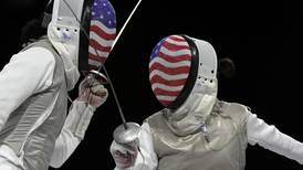Kiefer earns 2nd Olympic gold in women’s foil fencing with a victory over American teammate Scruggs