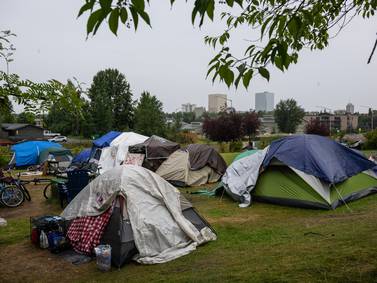 With encampment settled nearby, an Anchorage church plans city’s 1st small shelter village for homeless