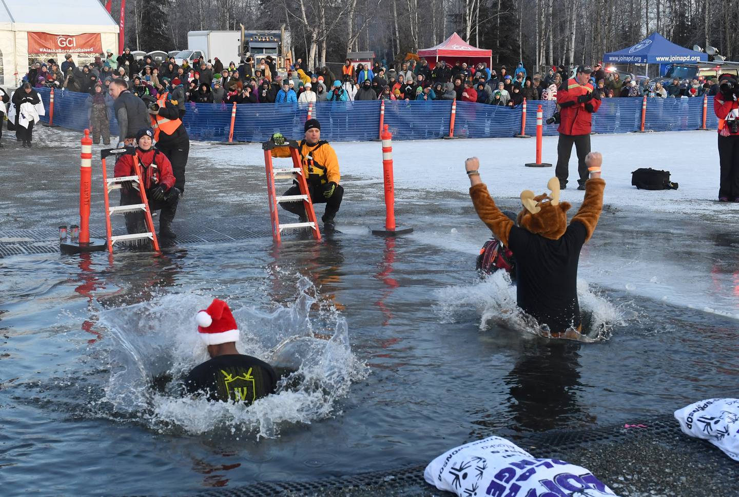 Hundreds take an icy leap at the annual Polar Plunge