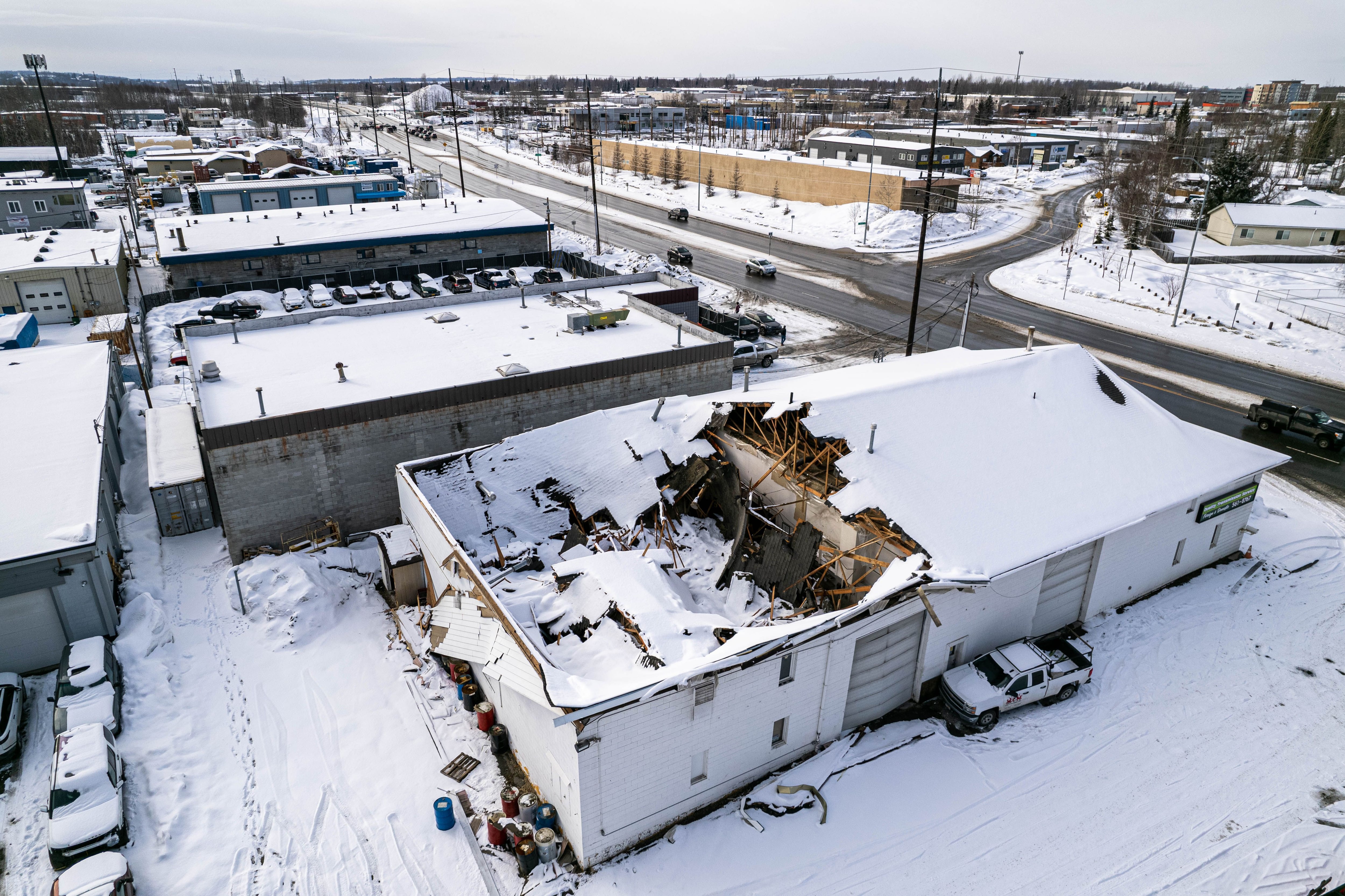 Brand new shopping centre collapses under weight of heavy ROOF