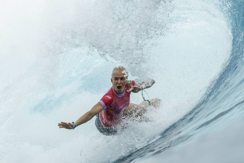 Surf’s up! Paris Olympics surfing competition commences in Tahiti, with wave rides and wipe outs