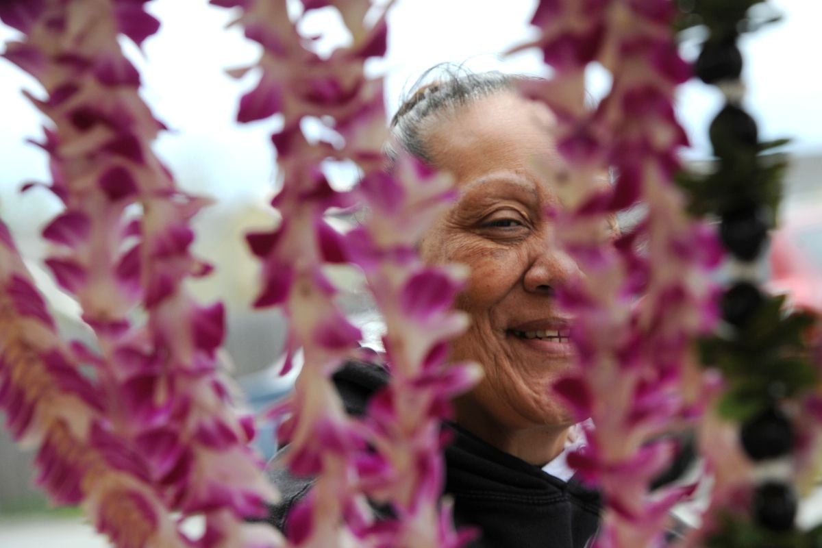 A Busy Lei Stand Is A Sign Of Graduation Season In Anchorage - judy masalosalo sold hand sewn flower leis at the corner of 15th avenue and gambell street