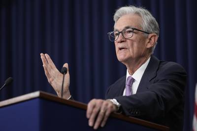 Federal Reserve cuts key rate by a sizable half-point, signaling an end to its inflation focus