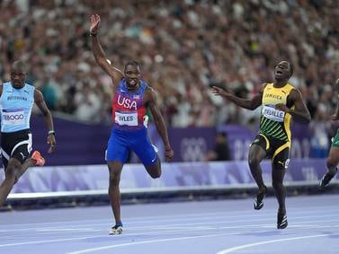 In a fraction of a blink, Noah Lyles becomes an Olympic legend