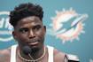 Tyreek Hill is detained by police before Dolphins game. Officer is subsequently placed on leave.