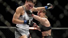 World champ brutalizes Alaska fighter Lauren Murphy in UFC title bout