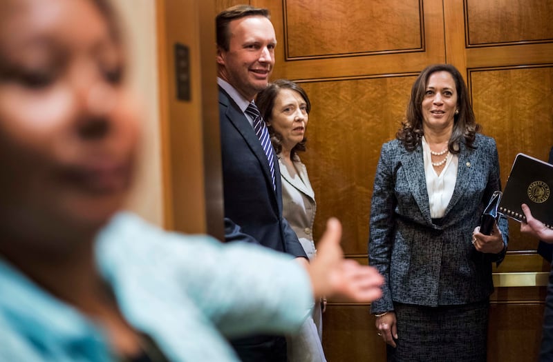 Kamala Harris waits on the Senators Only elevator in 2017, along with fellow Sens. Chris Murphy (D-Conn.) and Maria Cantwell (D-Wash.). Melina Mara/The Washington Post