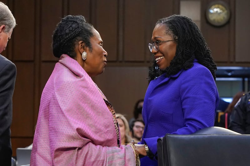FILE - Supreme Court nominee Judge Ketanji Brown Jackson, right, talks with Rep. Sheila Jackson Lee, D-Texas, during a break in Jackson's confirmation hearing before the Senate Judiciary Committee, March 21, 2022, on Capitol Hill in Washington. Longtime U.S. Rep. Sheila Jackson Lee, who helped lead federal efforts to protect women from domestic violence and recognize Juneteenth as a national holiday, has died Sunday, July 19, 2024, after battling pancreatic cancer, according to her chief of staff. (AP Photo/Jacquelyn Martin, File)