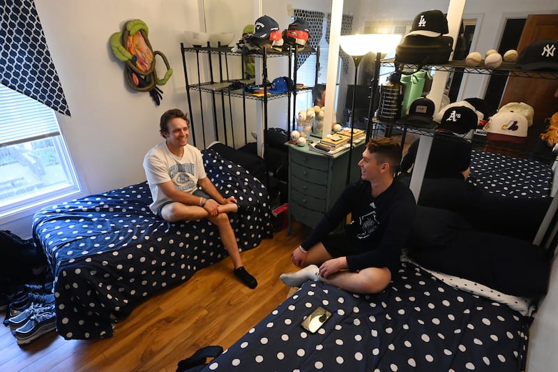 Anchorage Glacier Pilots left fielder Jacob Stinson, left, and second baseman Will Bermudez relax in their room in the home of host Carolyn Jones after a 3-0 shutout victory over the Mat-Su Miners on Tuesday, July 18, 2023. Besides staying with host Carolyn Jones they are roommates at UC Irvine, where they play collegiate baseball. (Bill Roth / ADN) 