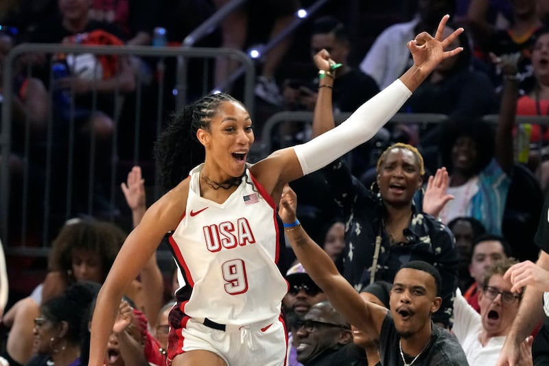 A'ja Wilson, of Team USA, celebrates after she made 3-point basket against Team WNBA during the second half of a WNBA All-Star basketball game Saturday, July 20, 2024, in Phoenix. (AP Photo/Ross D. Franklin)