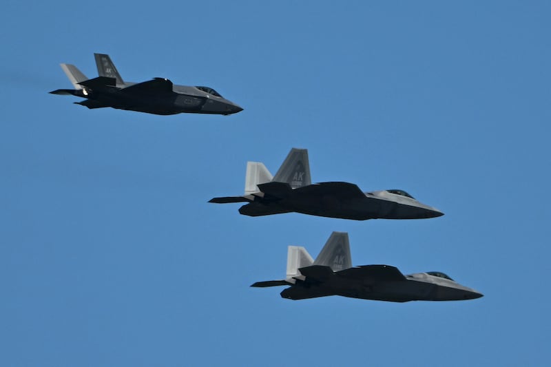 U.S. Air Force fifth generation fighters a F-35A Lightning II, left, and a pair of F-22 Raptors performed during the Joint Forces Demonstration on final day of the Arctic Thunder Open House at Joint Base Elmendorf-Richardson on Sunday, July 21, 2024. (Bill Roth / ADN)