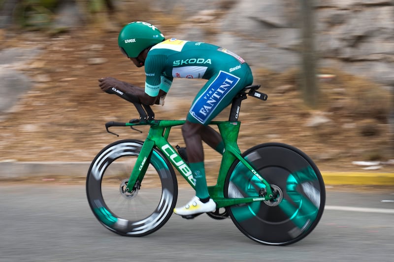 Eritrea's Biniam Girmay, wearing the best sprinter's green jersey, rides during the twenty-first stage of the Tour de France cycling race, an individual time trial over 33.7 kilometers (20.9 miles) with start in Monaco and finish in Nice, France, Sunday, July 21, 2024. (AP Photo/Jerome Delay)