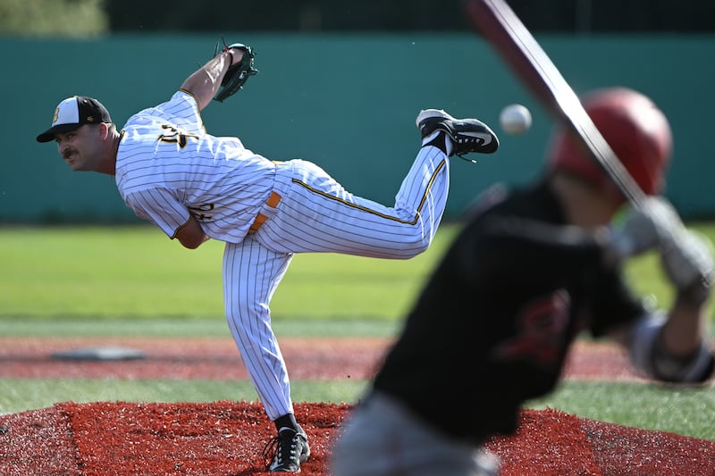 Anchorage Bucs starting pitcher Cameron Crain hurls the ball during a 12-2 victory over the Peninsula Oilers at Mulcahy Stadium on Thursday, July, 13, 2023. (Bill Roth / ADN) 
