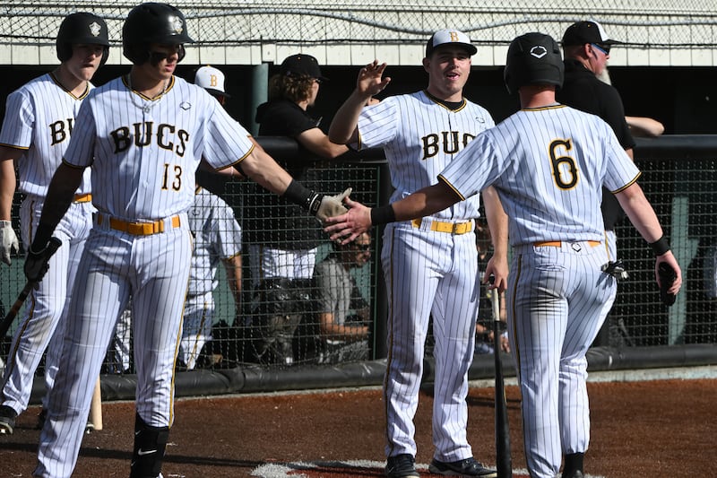 Alex Pendergast celebrates scoring a run during the Anchorage Bucs' 12-2 victory over the Peninsula Oilers at Mulcahy Stadium on Thursday, July, 13, 2023. (Bill Roth / ADN) 