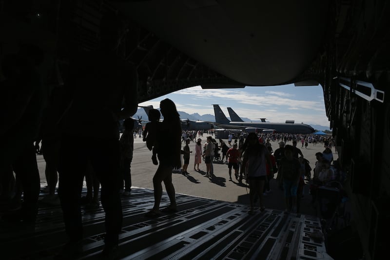 People get an inside look at an Air National Guard C-17 with a display of the Critical Care Air Transport Team set up inside the aircraft during the Arctic Thunder Open House on Saturday. (Bob Hallinen Photo)
