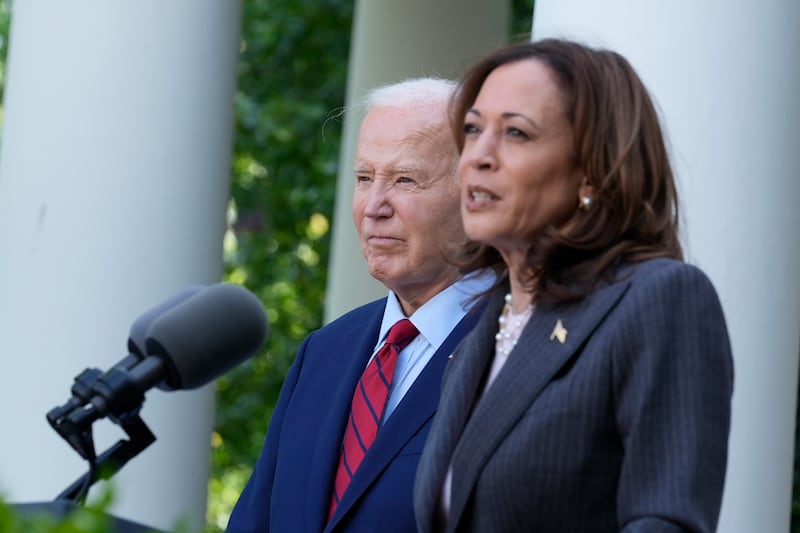 President Joe Biden listens as Vice President Kamala Harris speaks in the Rose Garden of the White House in Washington, May 13, 2024. (Susan Walsh/AP)