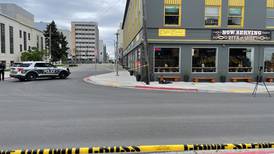 Man shot by Anchorage police after fatal downtown shooting remains hospitalized